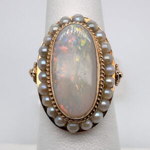 Opal and Pearl Halo Ring in Yellow Gold